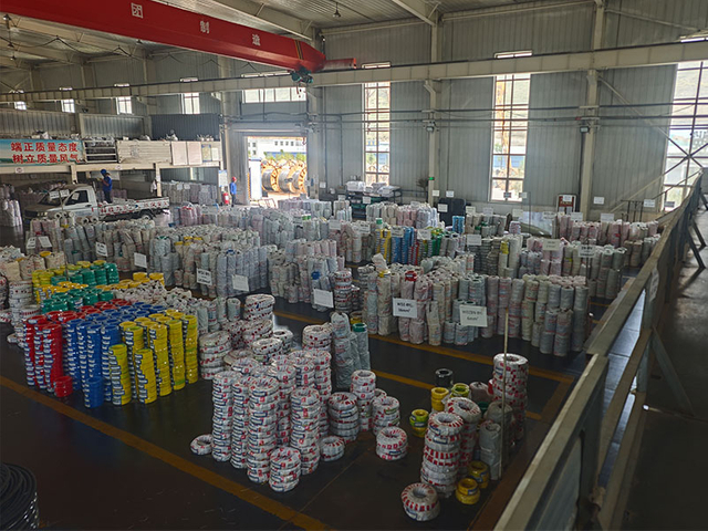 Finished electrical wire rolls and household cables inventory in factory warehouse